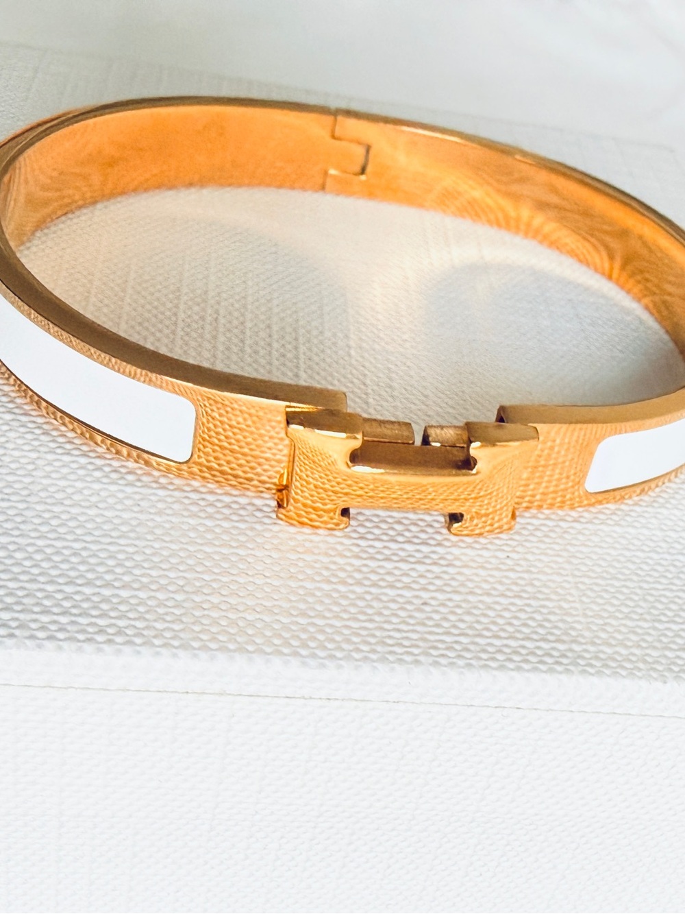 Gold Metal and Gold plated’H' Bangle with White Enamel